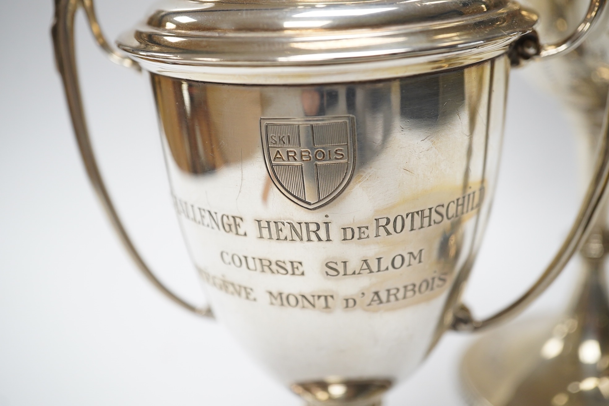 A Victorian engraved silver presentation goblet, with Masonic inscription, London, 1880, 19.5cm, together with a modern silver presentation goblet and a silver two handled presentation trophy cup and cover, 20.2oz. Condi